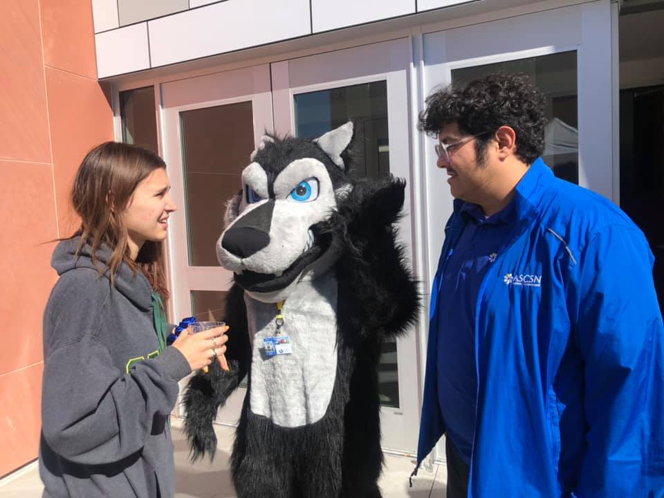 Cody the Coyote Mascot with students
