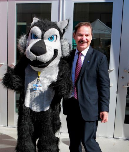 CSN President Dr. Zaragoza and Coyote mascot 