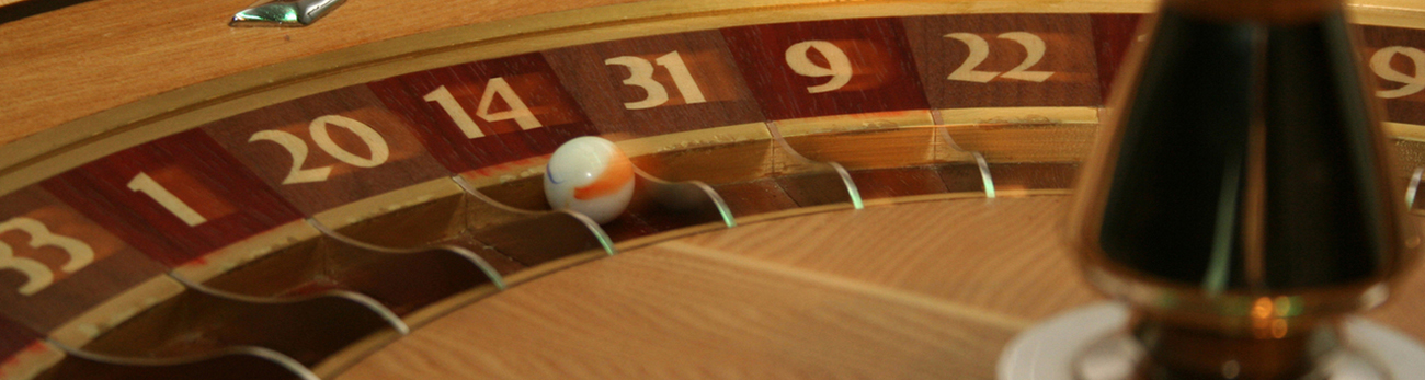 Roulette wheel with ball in the 14 slot