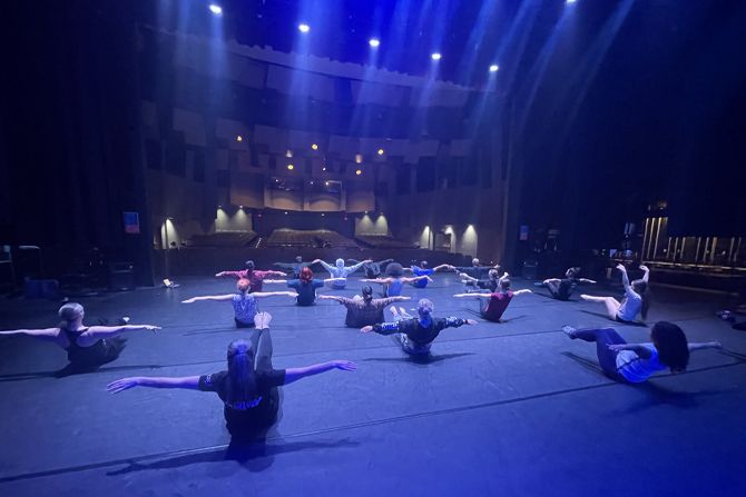 image of dance students warming up on the Nicholas J. Horn Theatre stage