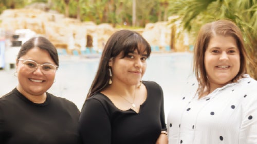 Women smiling at college