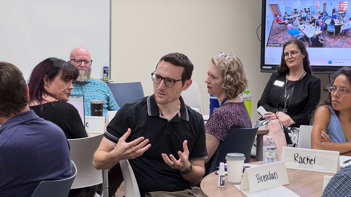 CSN faculty participate in a small-group discussion during a Faculty Center workshop.
