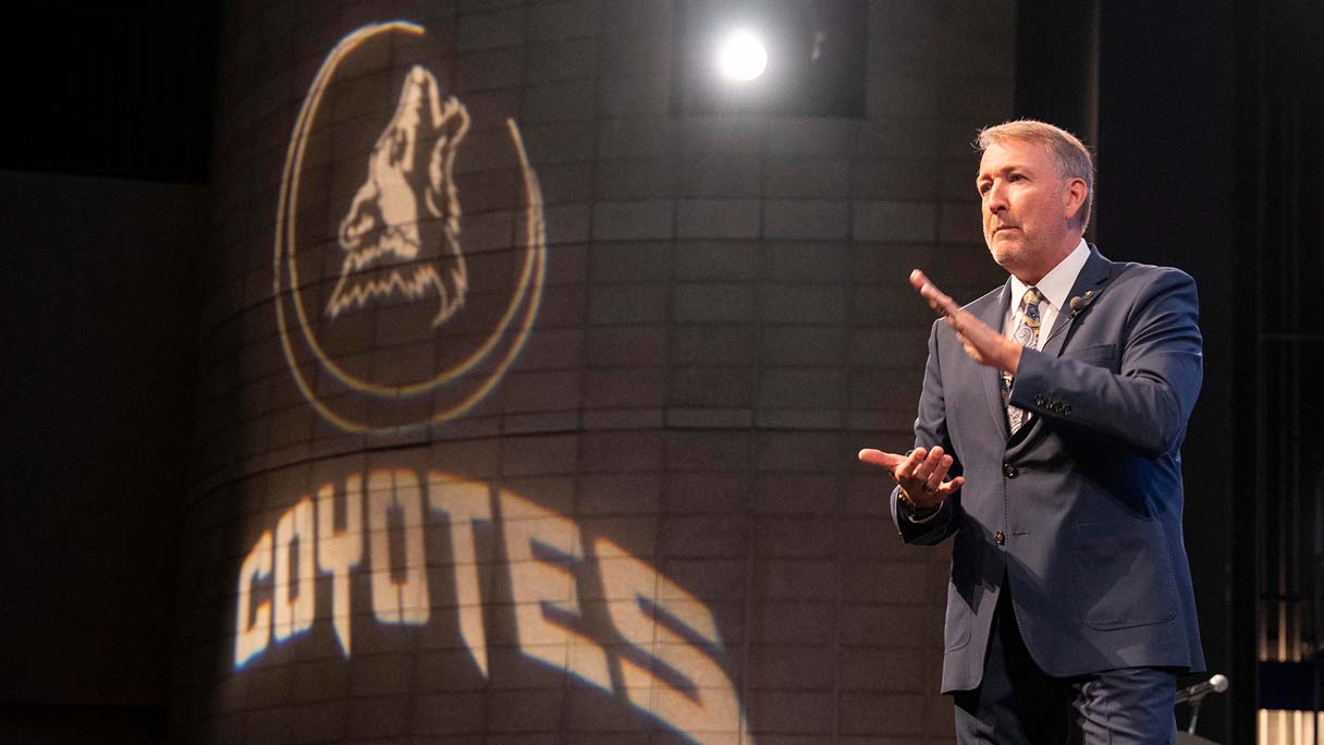 College of Southern Nevada President Dr. Stacy Klippenstein speaking on stage at an event.